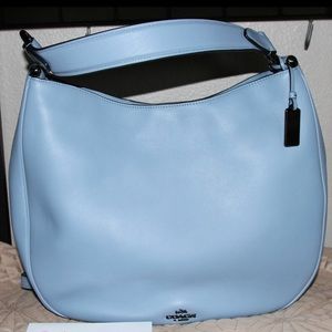 Sold New Coach Nomad